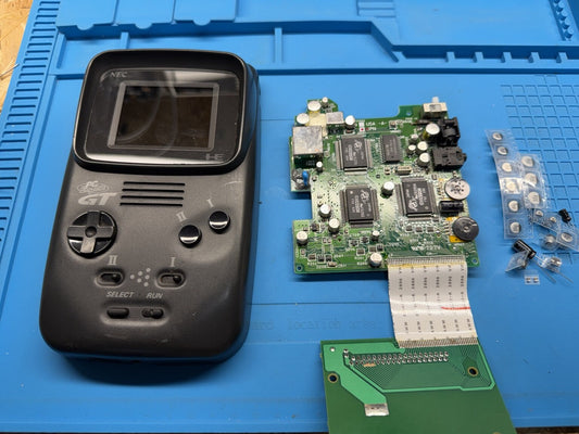 PC Engine GT dismantled on the FrameRate Builds workbench before capacitor replacement