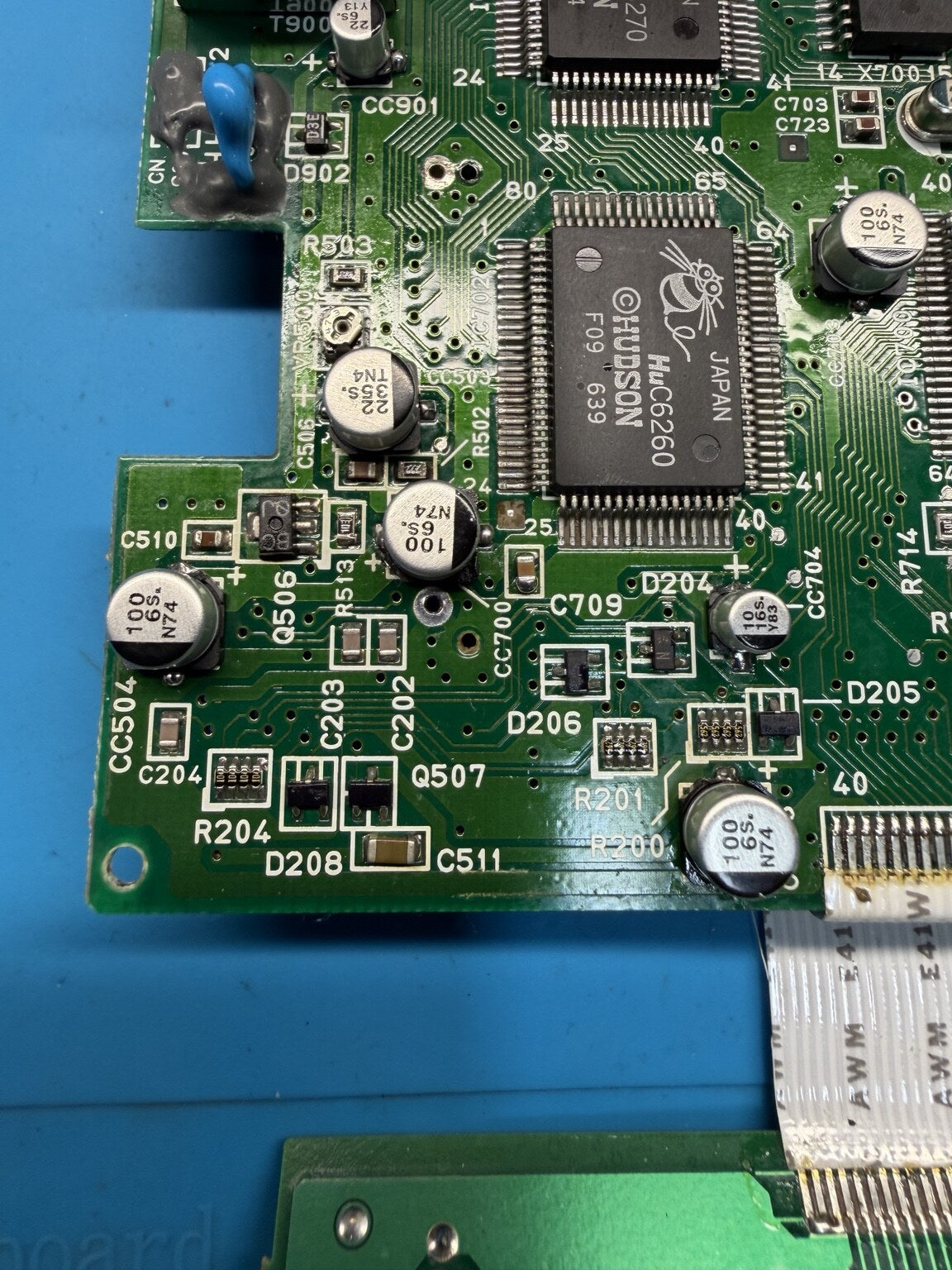 Close-up of newly fitted capacitors on a recapped PC Engine GT motherboard