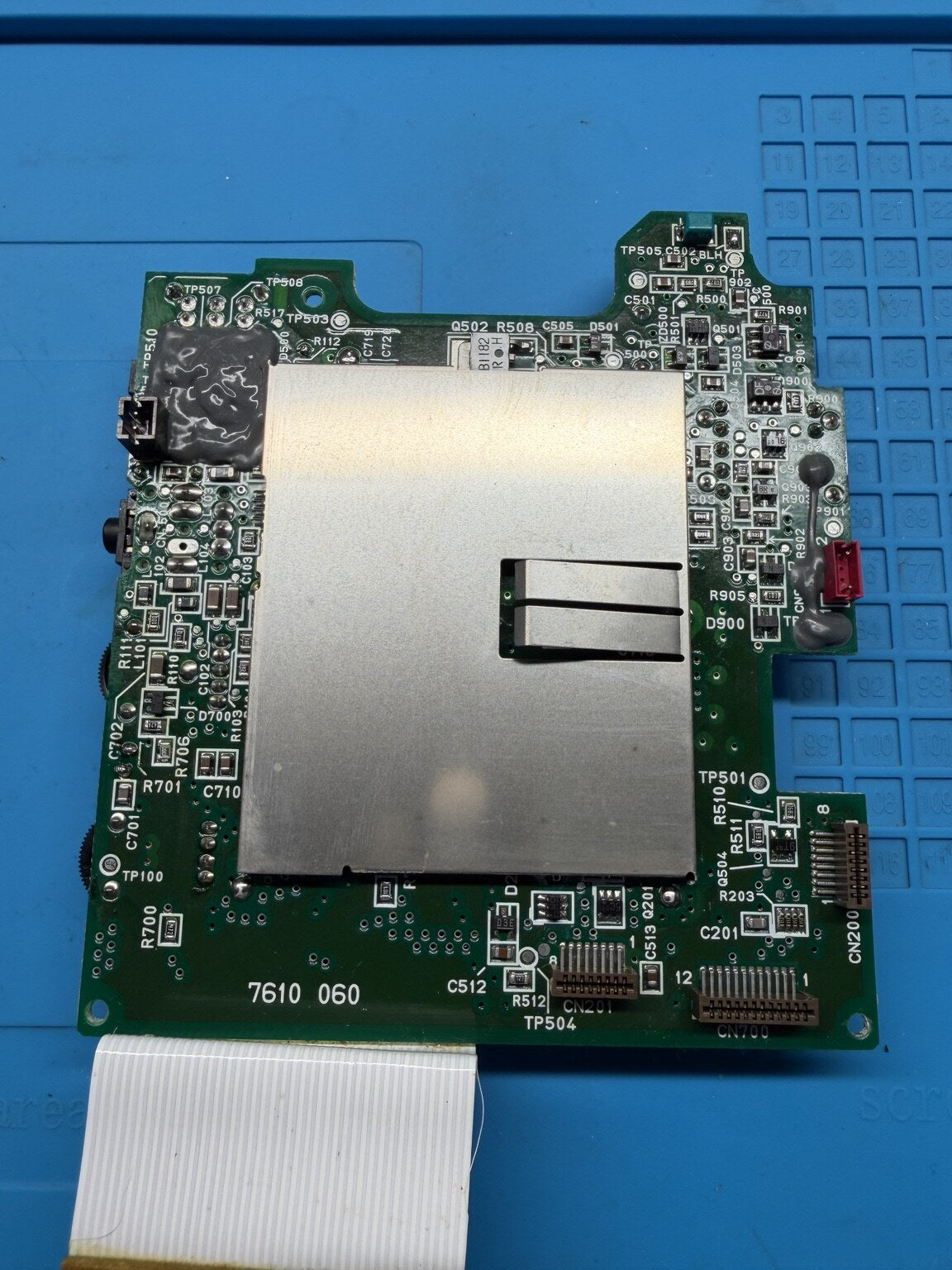 Rear of PC Engine GT board with original RF shield refitted after recap